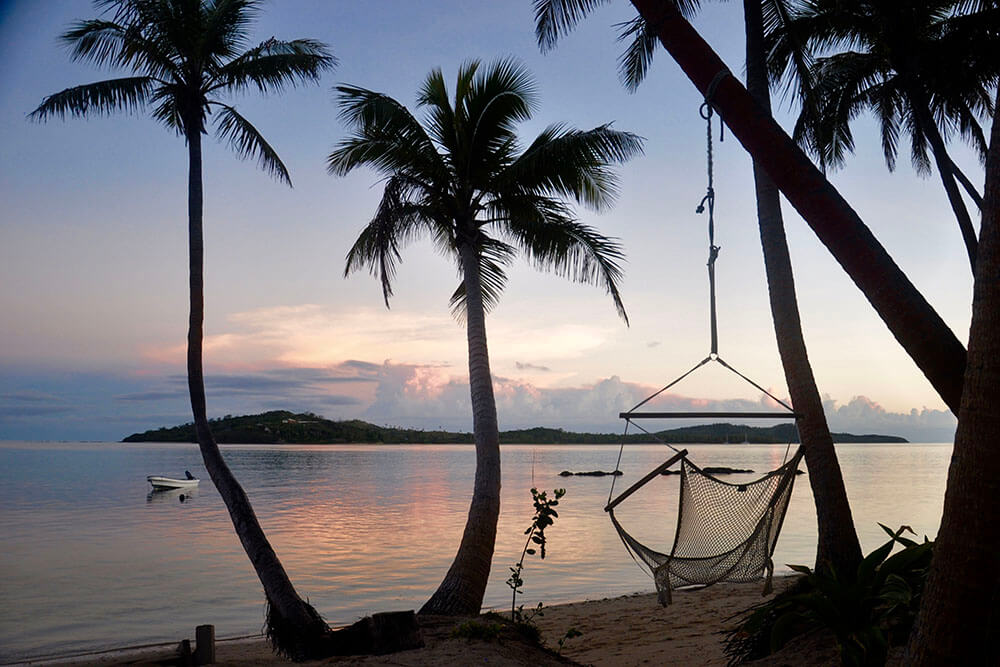 coconut-beach-resort-beach-sunset-hammock